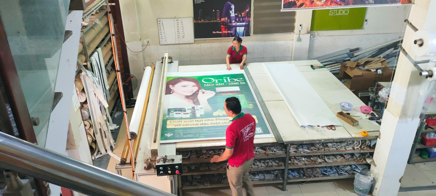 Rèm cuốn in logo MC-04 11 rem in quang cao